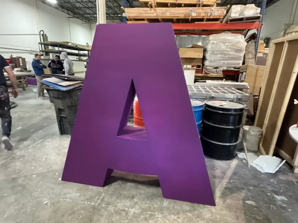 Oversized 3D Letters And Logo 4